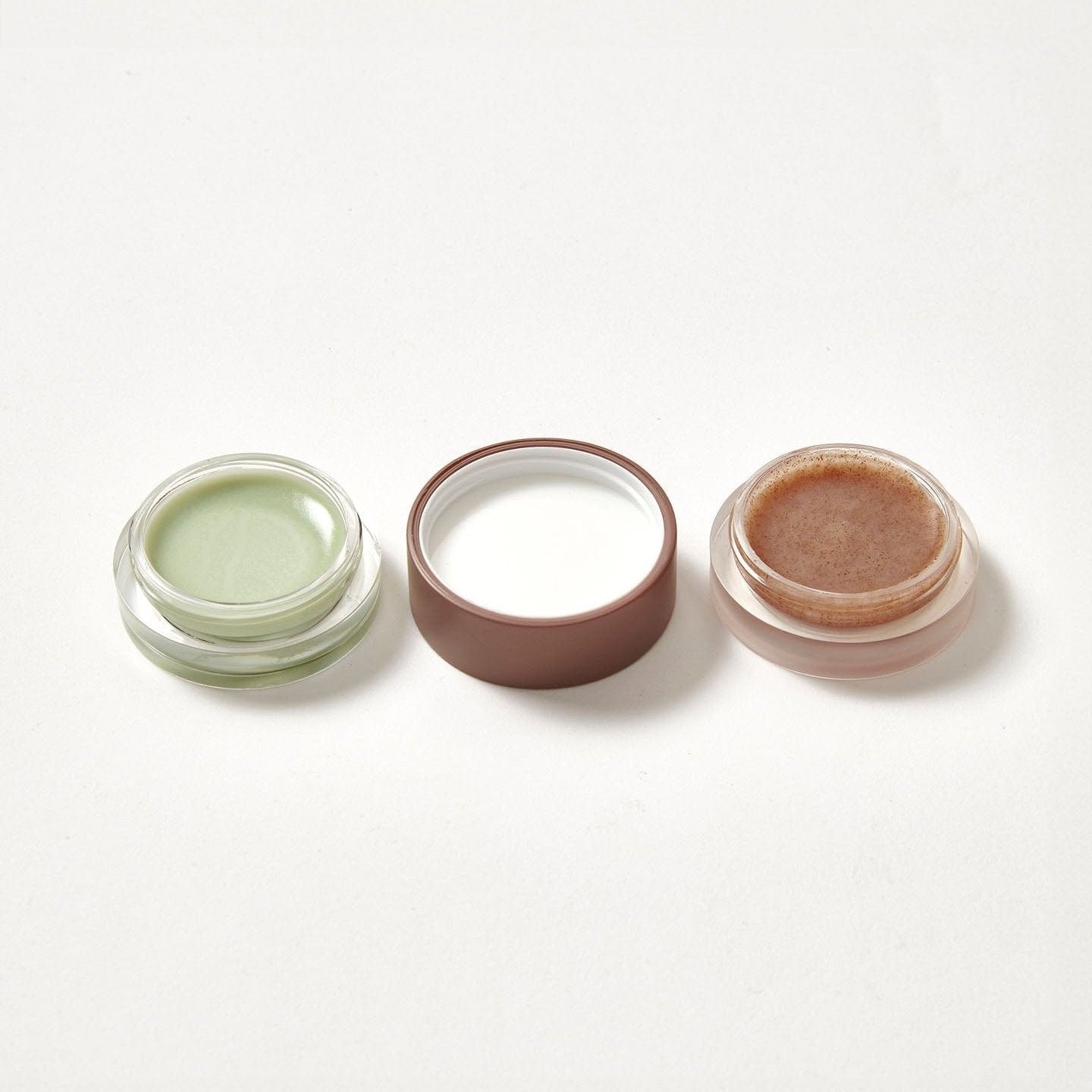 A lip balm and scrub duo in the flavour Mint Choc Chip open on both sides.