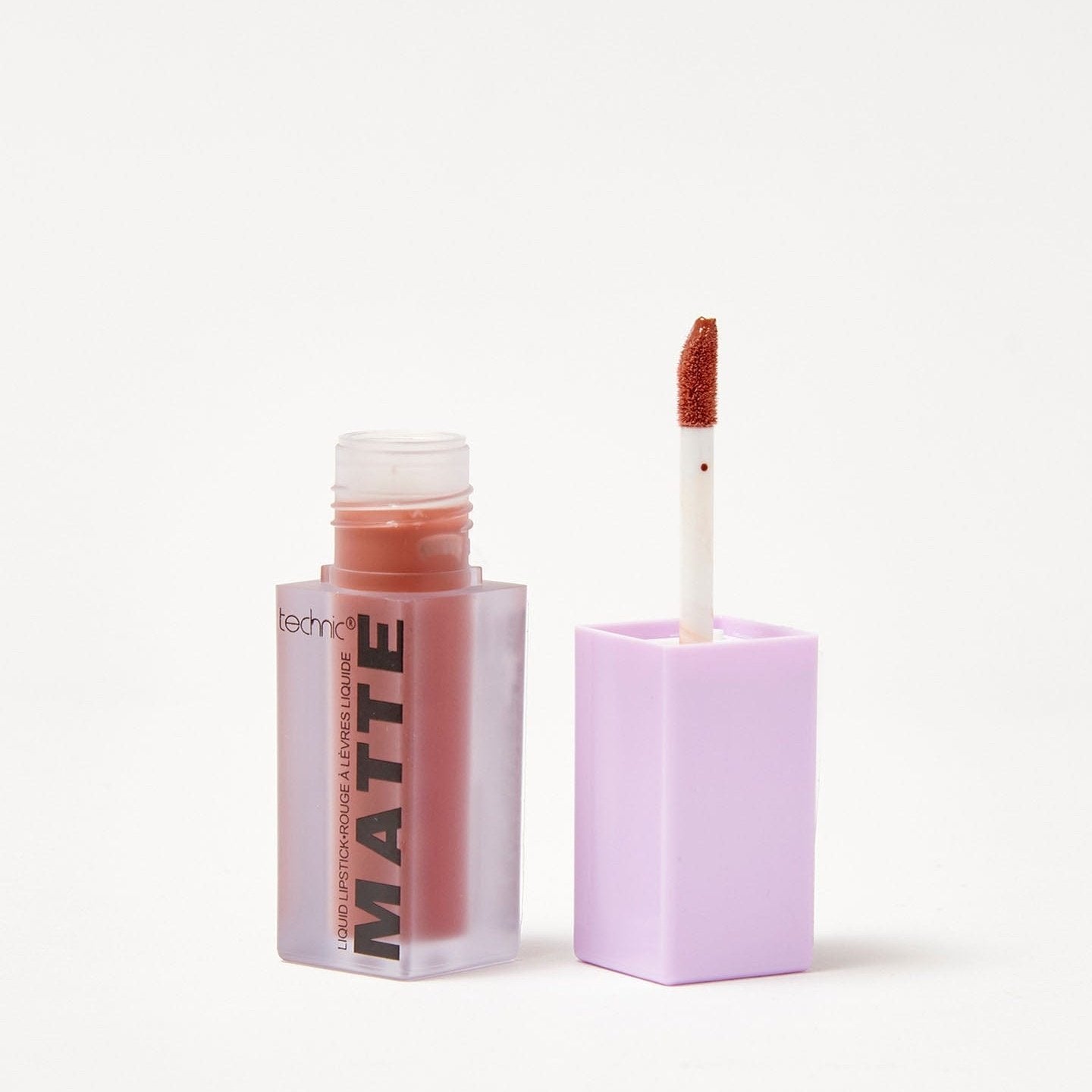 An opened matte liquid lipstick in the shade Sweet Sienna on a white background.