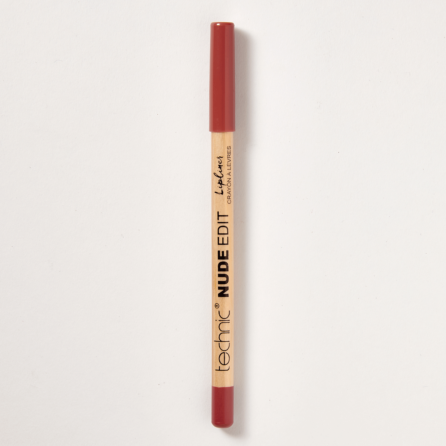 A nude edit lip liner in the shade In The Buff on a white background.