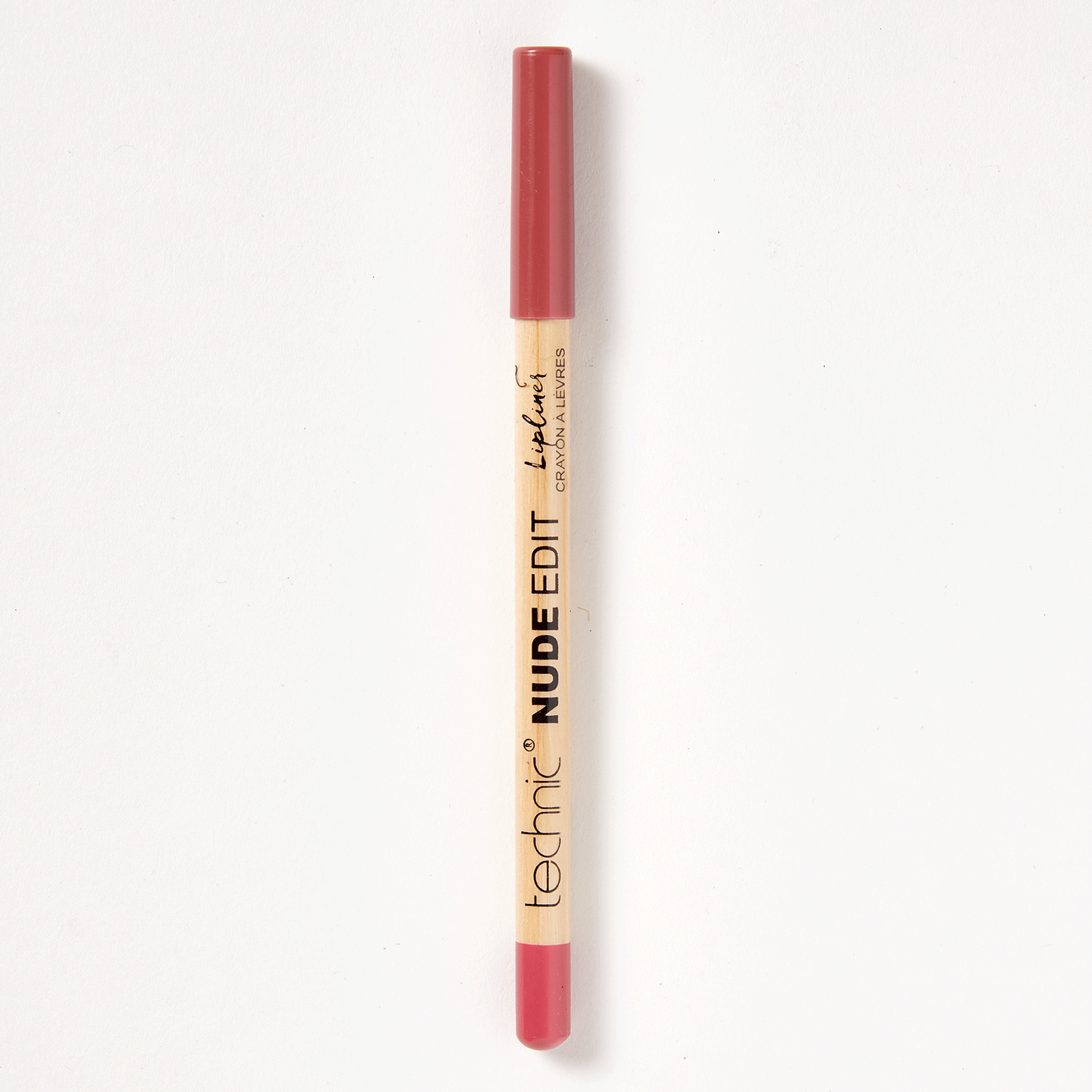 A nude edit lip liner in the shade Nudie on a white background.