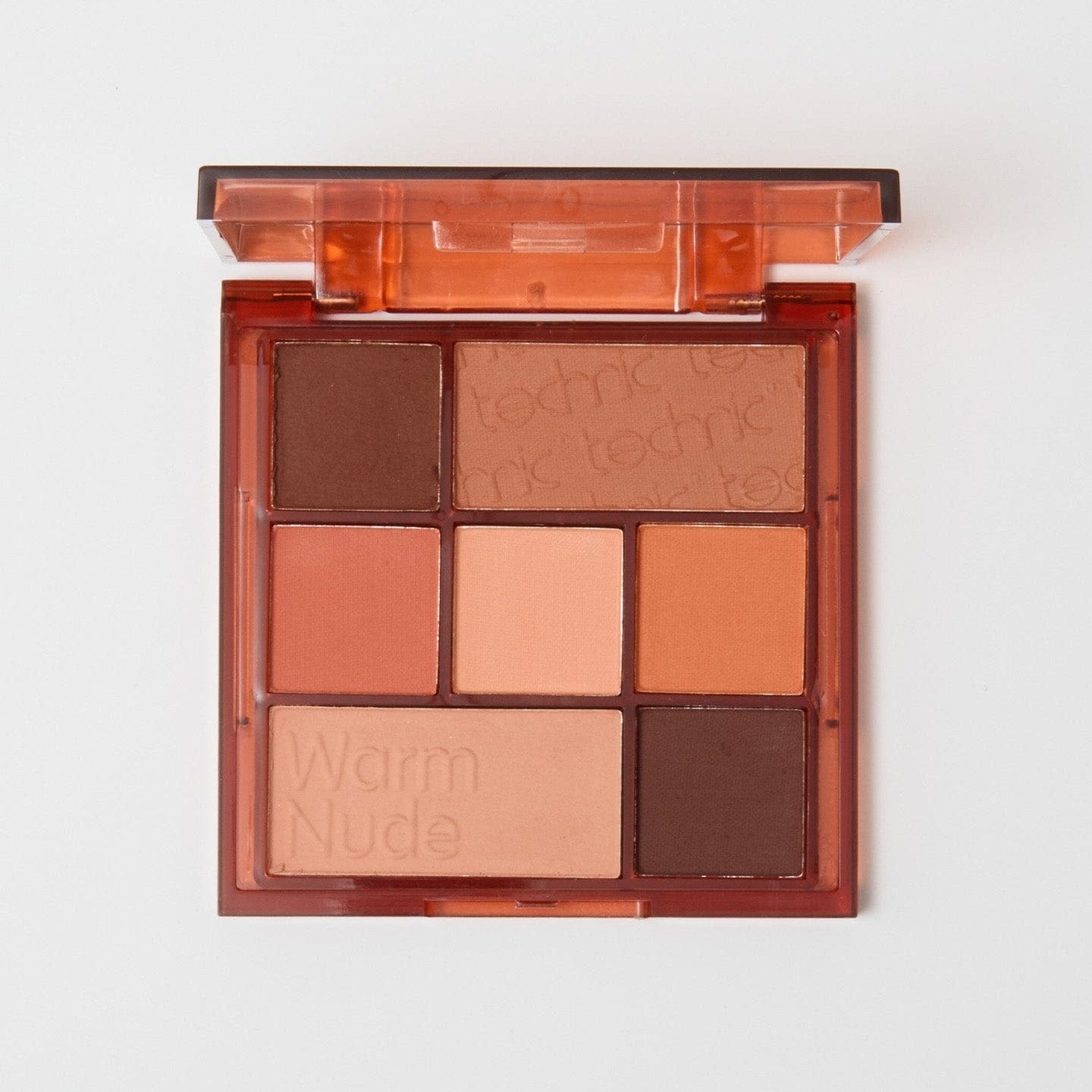 An opened palette in the shade Warm Nude on a white background.