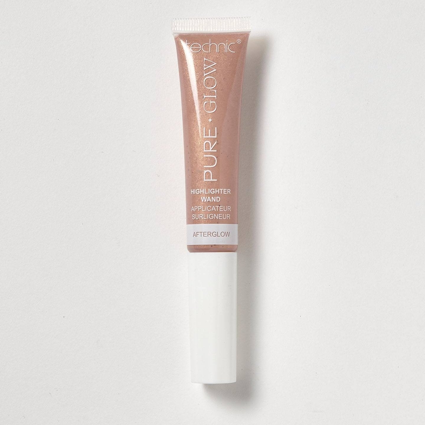 A highlighter wand in the shade Afterglow on a white background.