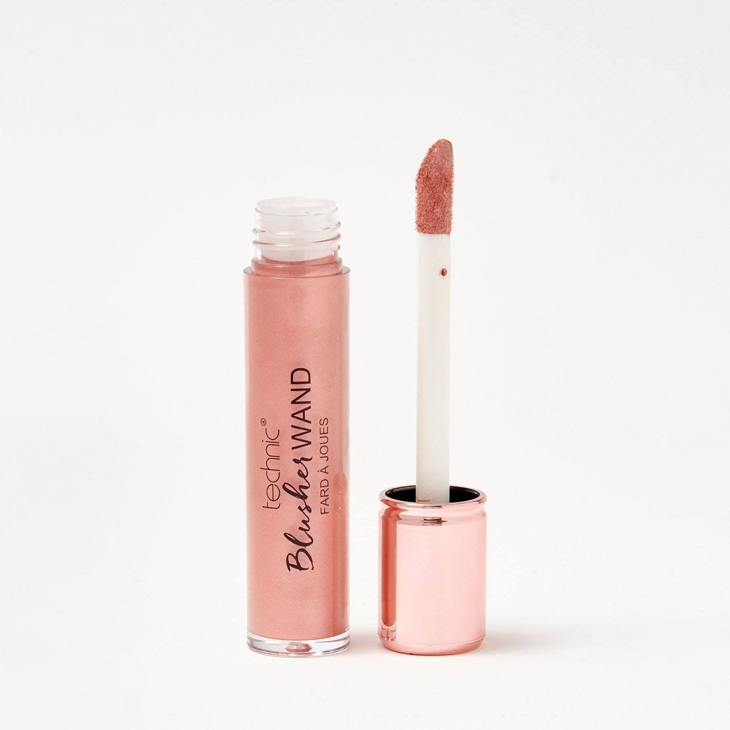 An opened blusher wand in the shade tempt me on a white background.