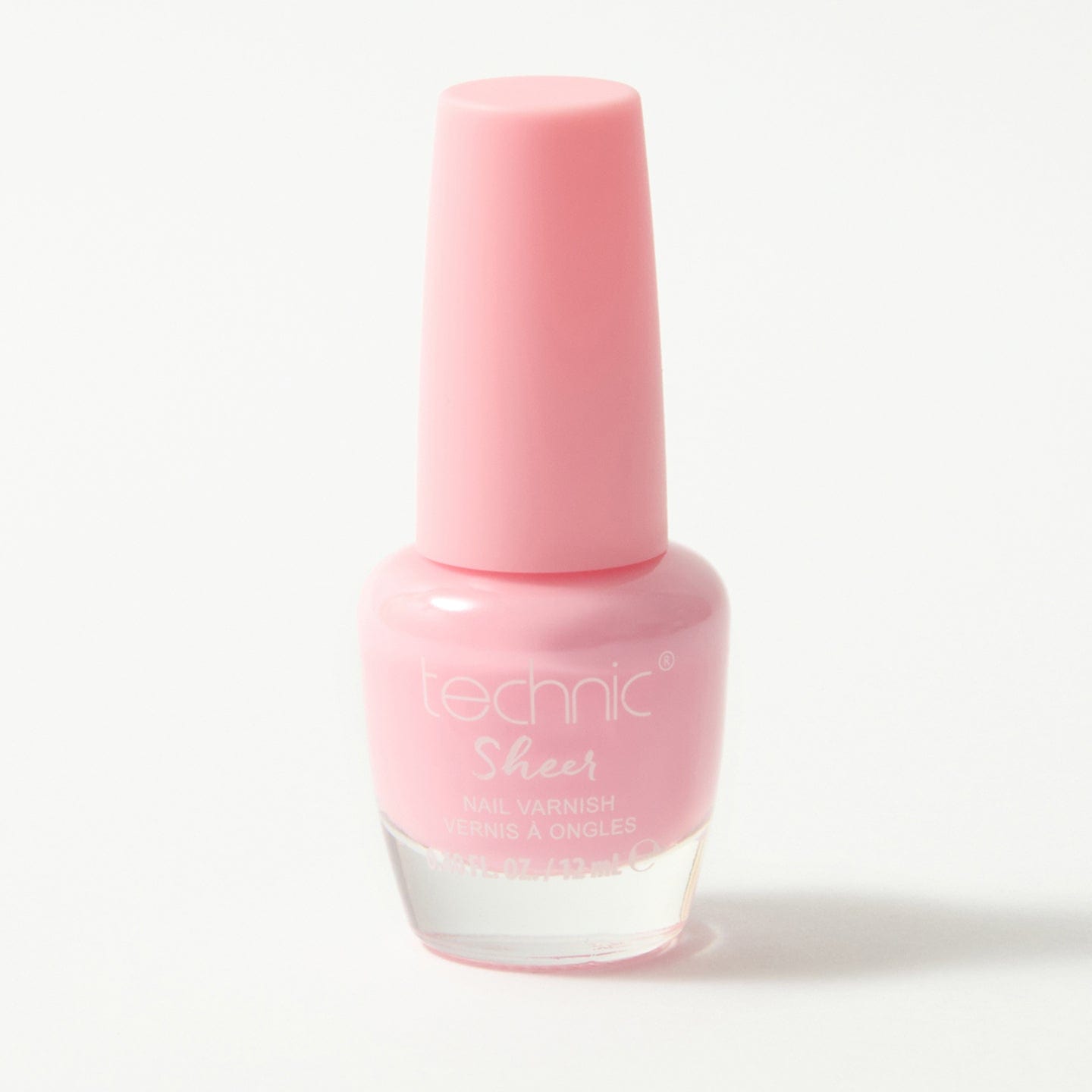 A bottle of sheer nail varnish in the shade pink on a white background.