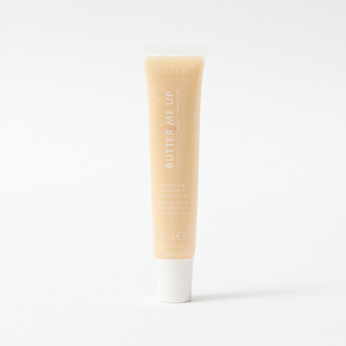 A butter me up lip balm in the shade Bare Necessity on a white background