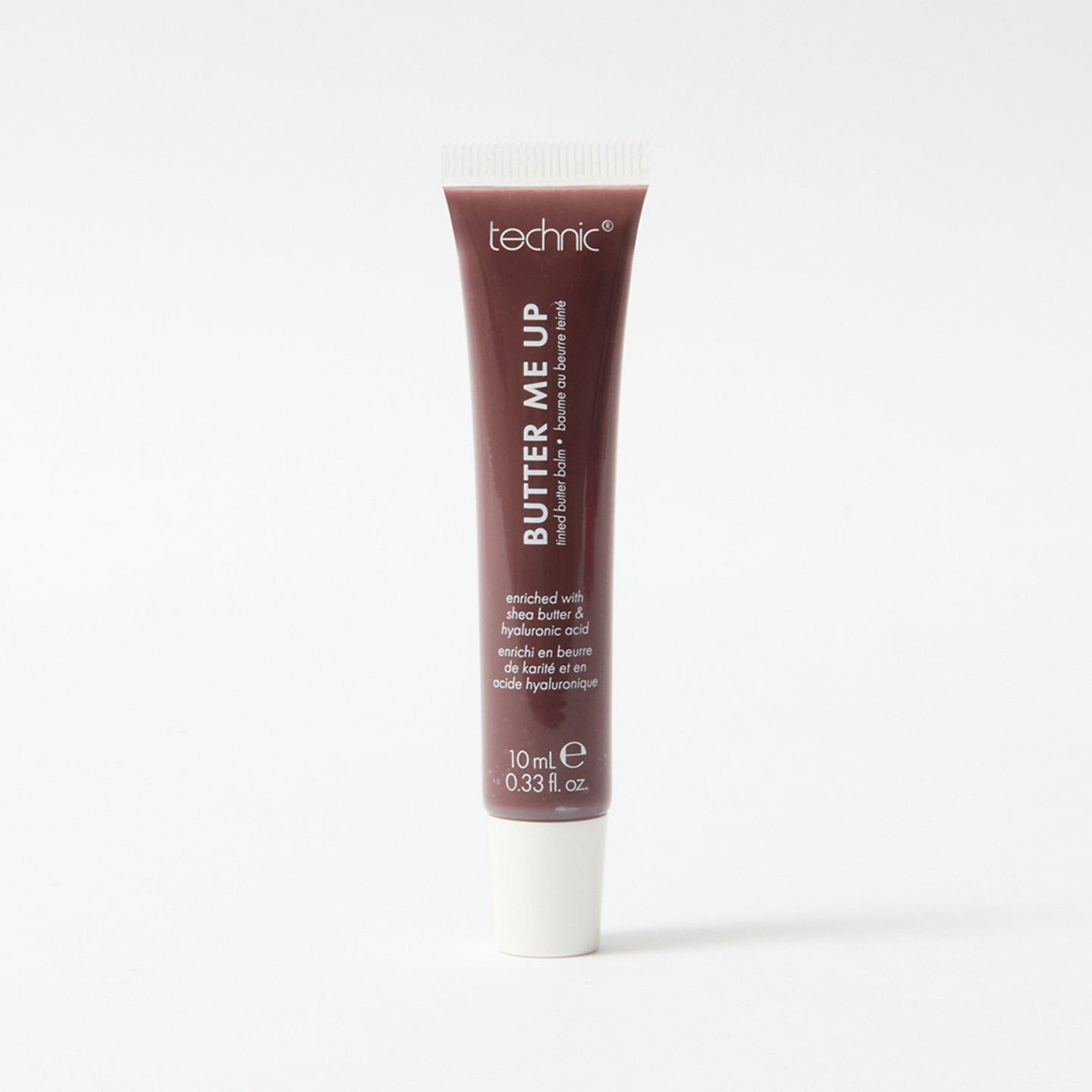 A butter me up lip balm in the shade Toffee Candy on a white background.