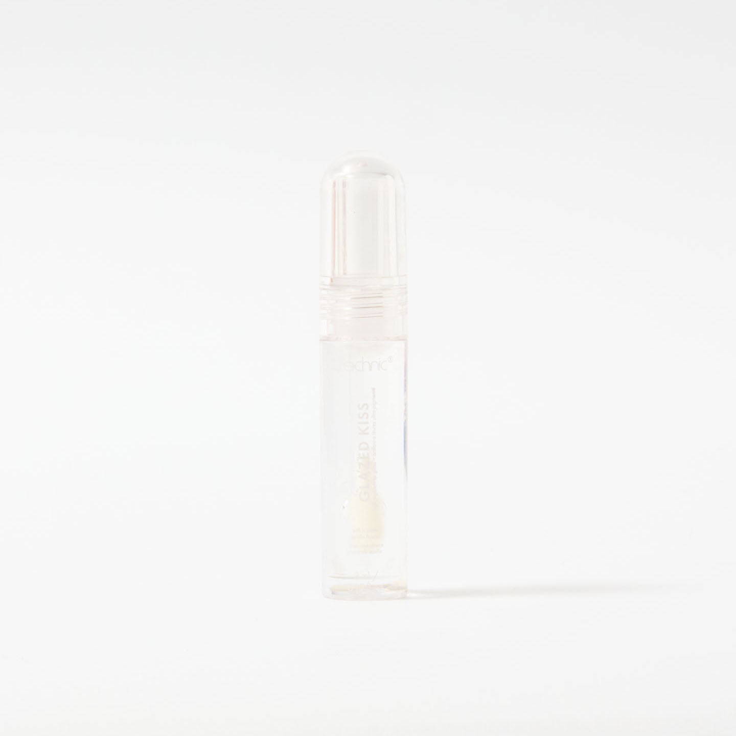 A glazed kiss lip gloss in the shade Crystal Clear on a white background.