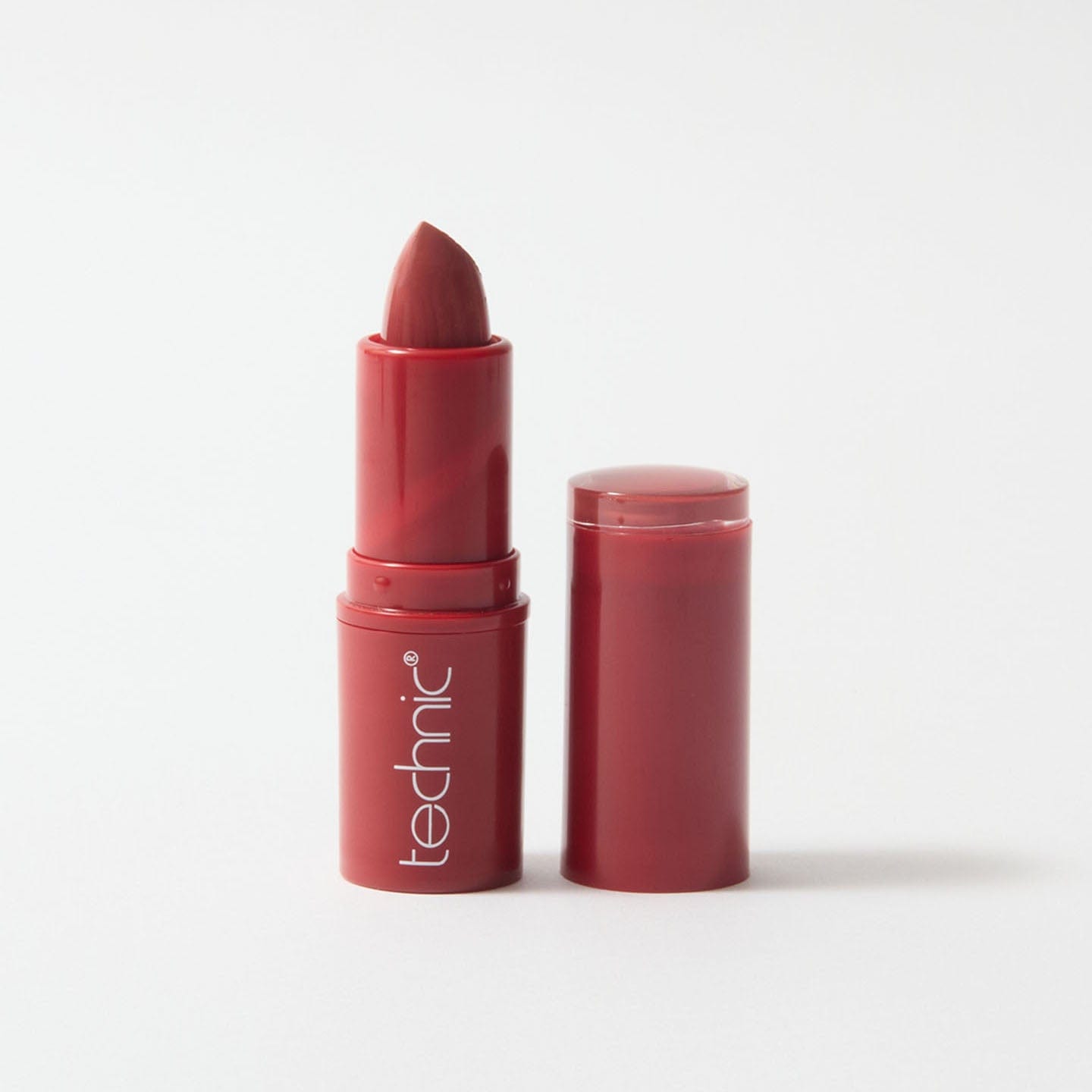 An open lipstick in the shade Heartbreaker on a white background.