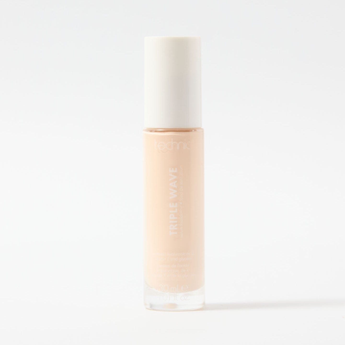 A triple wave foundation bottle in the shade Fair on a white background.