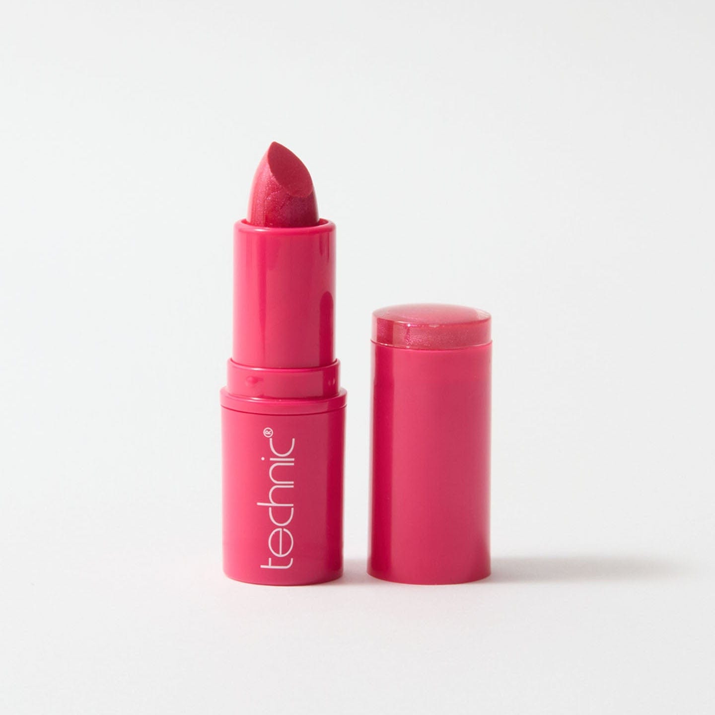 An open lipstick in the shade Hot Pink on a white background.